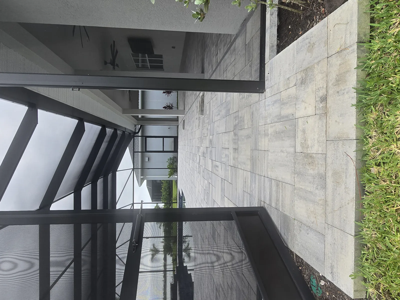 Newly installed lanai pavers before sealing