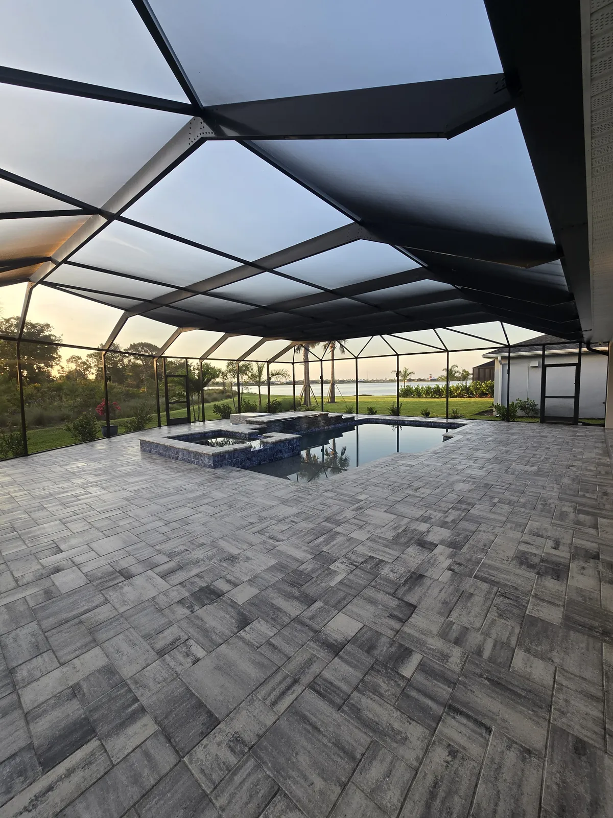 Paver driveway and garage apron after sealing