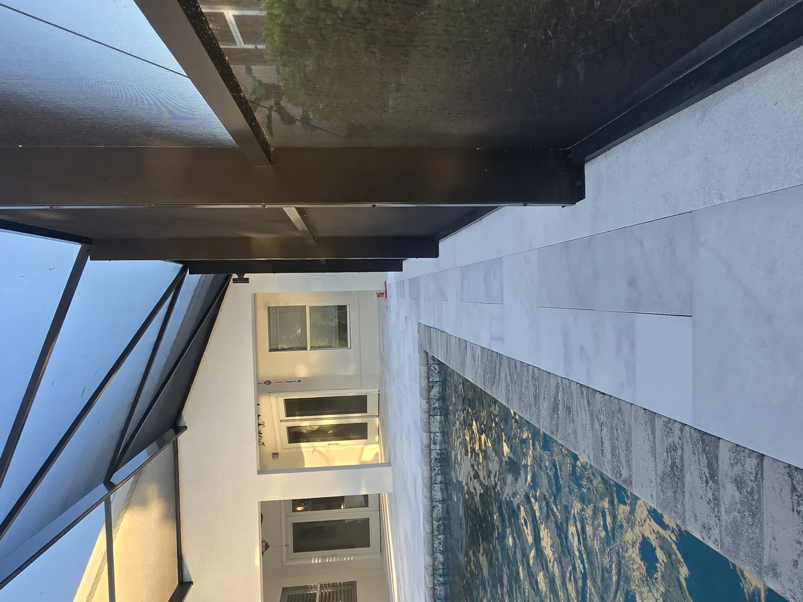 White marble lanai in Estero after iron stain removal and sealing