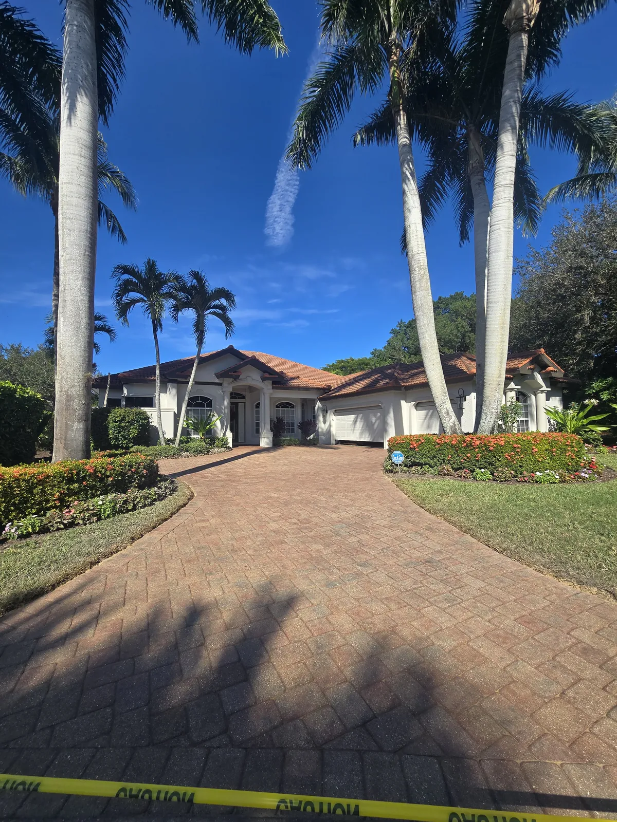 Paver driveway in Grey Oaks, Naples after stripping and resealing