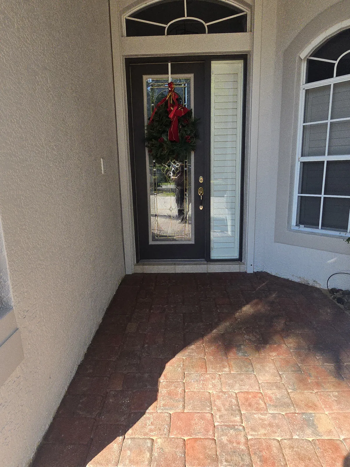 Front entry pavers after cleaning and sealing