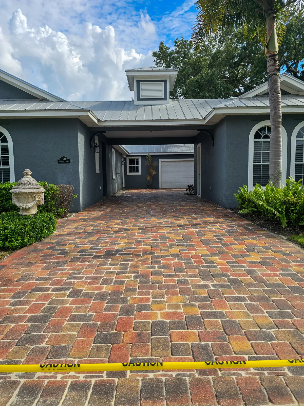 Sealed paver driveway with low-gloss finish in McGregor Reserve, Fort Myers
