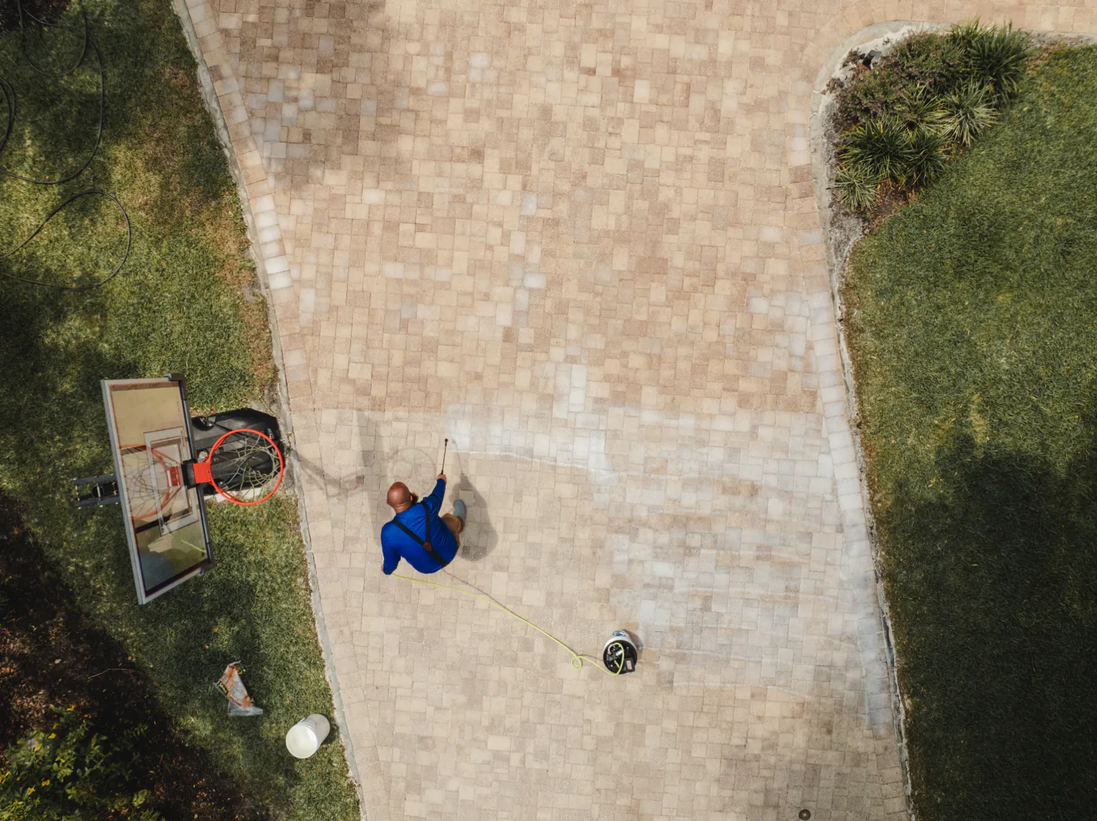 Drone view of the paver driveway during the sealing project
